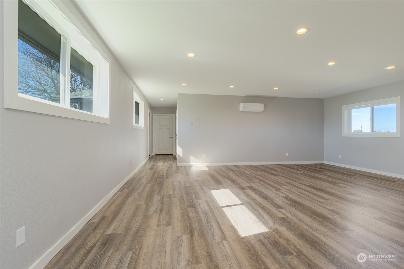 1479 Spring Branch Road Walla Walla, WA 99362 - Photo 26 of 40 a view of empty room with wooden floor and fan