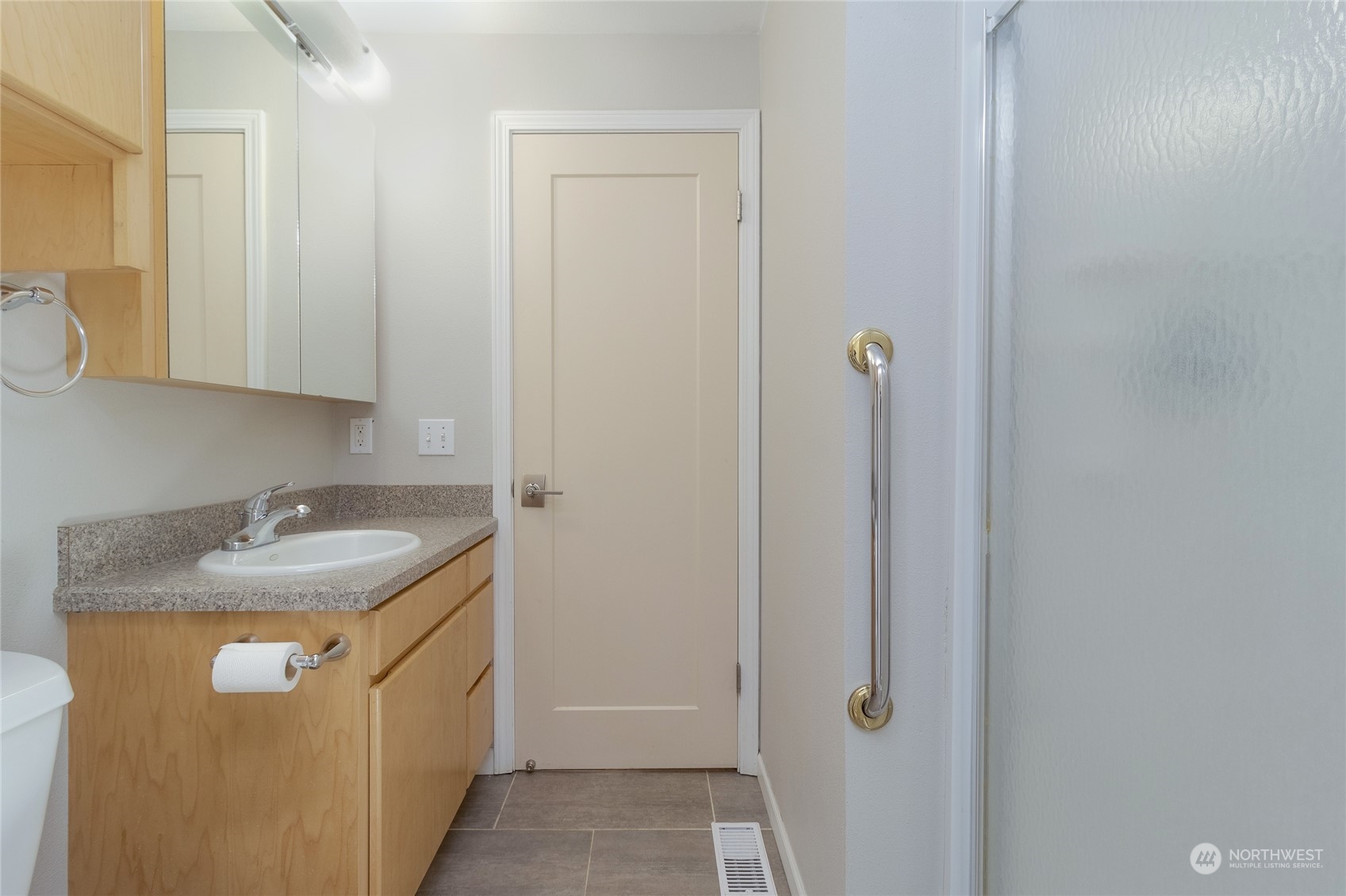 1479 Spring Branch Road Walla Walla, WA 99362 - Photo 31 of 40 a bathroom with a granite countertop sink and a vanity