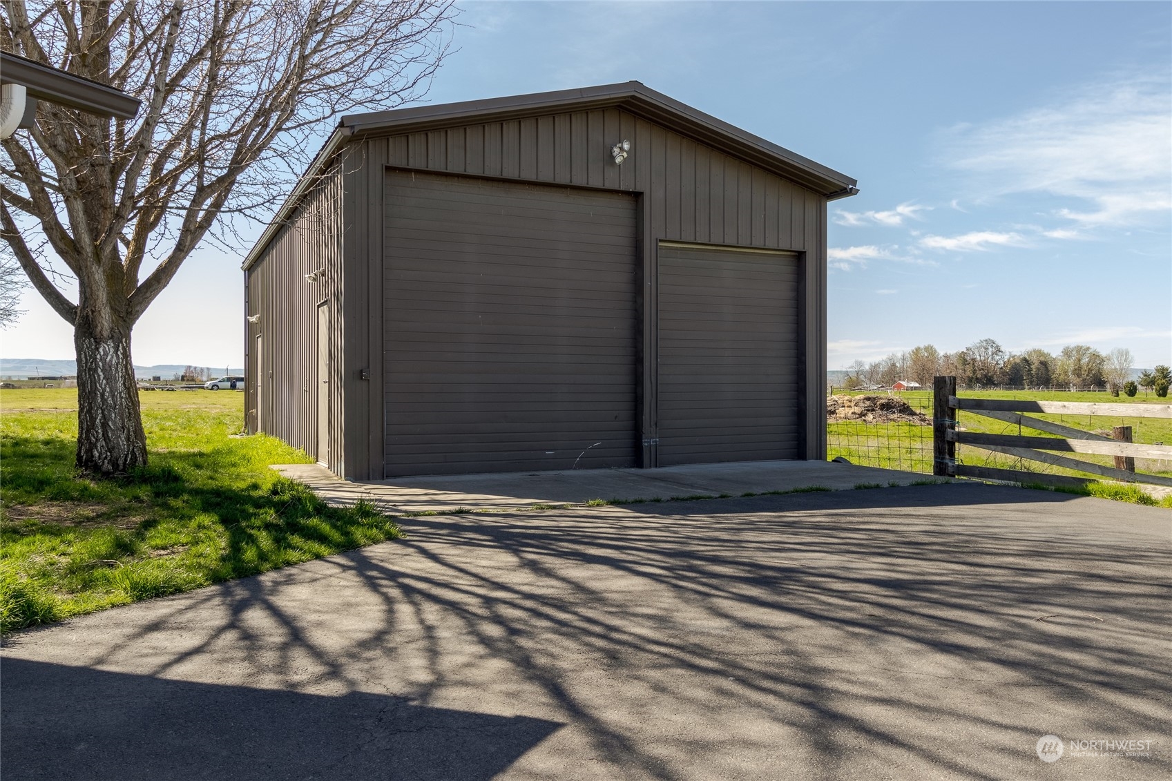 1479 Spring Branch Road Walla Walla, WA 99362 - Photo 34 of 40 a view of a house with backyard and trees