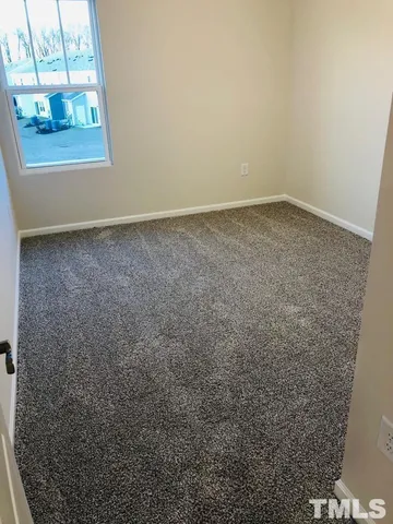 a bathroom with a toilet a sink and a shower