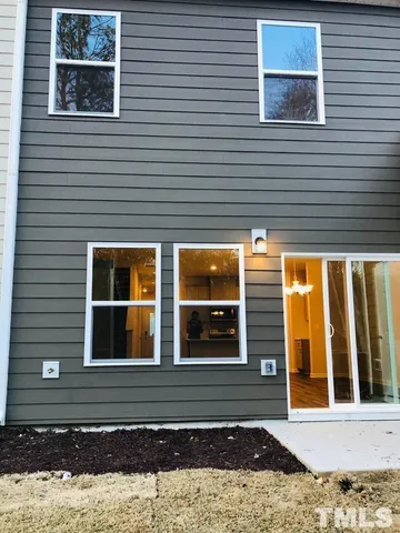 a view of a yard with trees