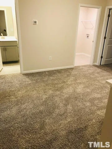 an empty room with an entryway