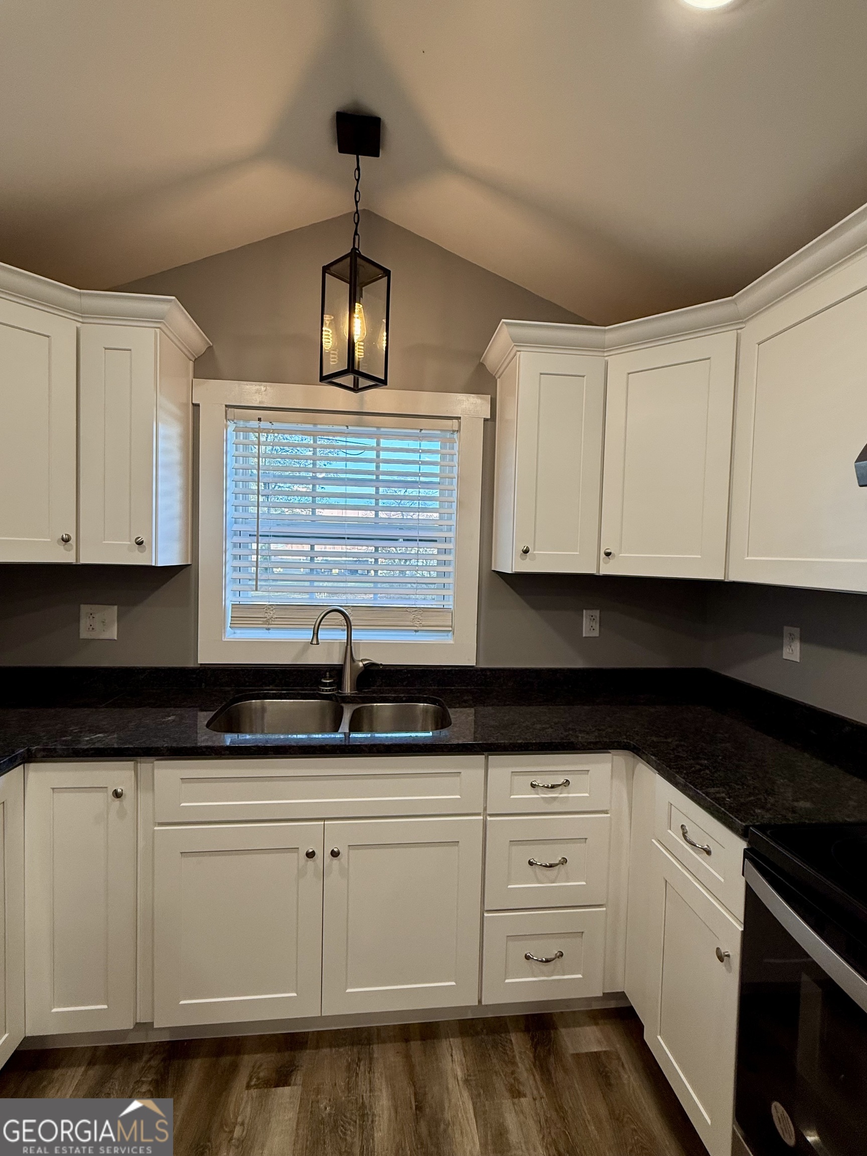 41 6th Street Trion, GA 30753 - Photo 21 of 60 a kitchen with granite countertop a sink stainless steel appliances and cabinets