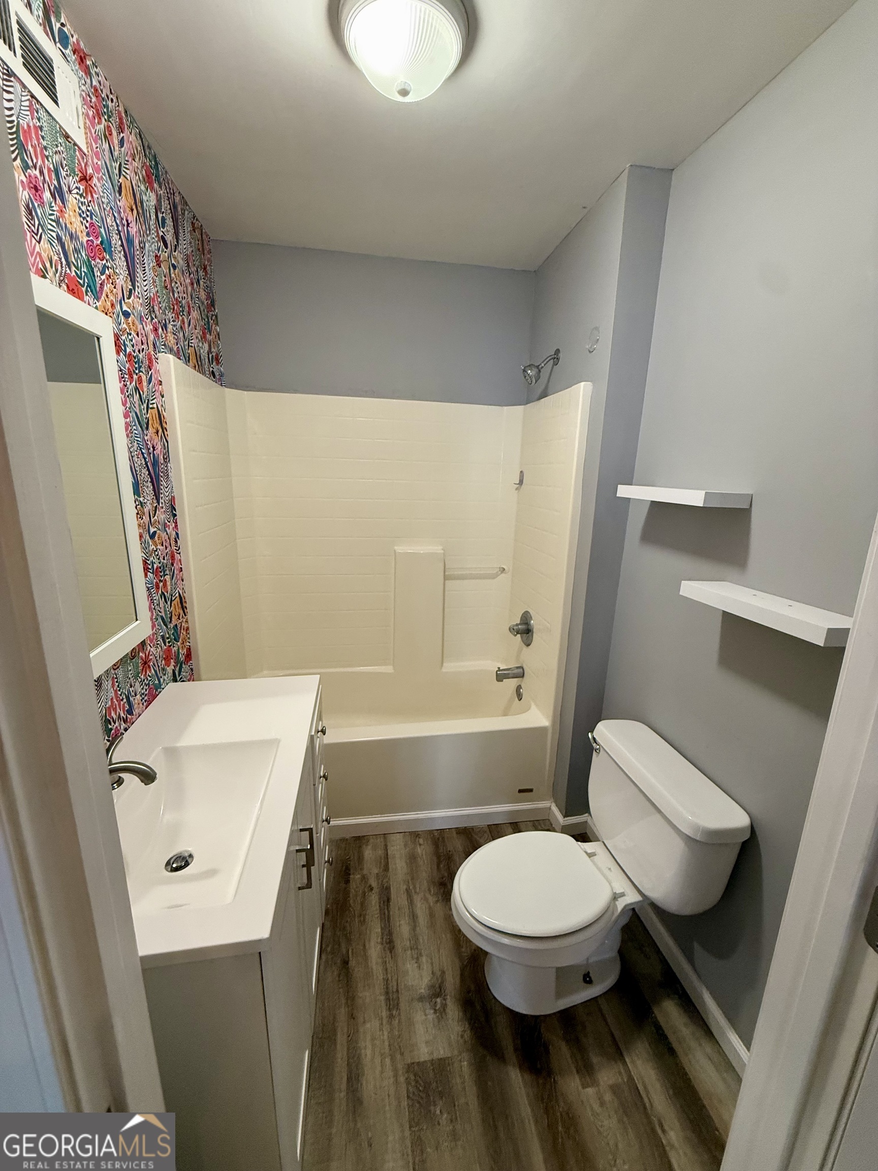 41 6th Street Trion, GA 30753 - Photo 29 of 60 a bathroom with a sink toilet and shower