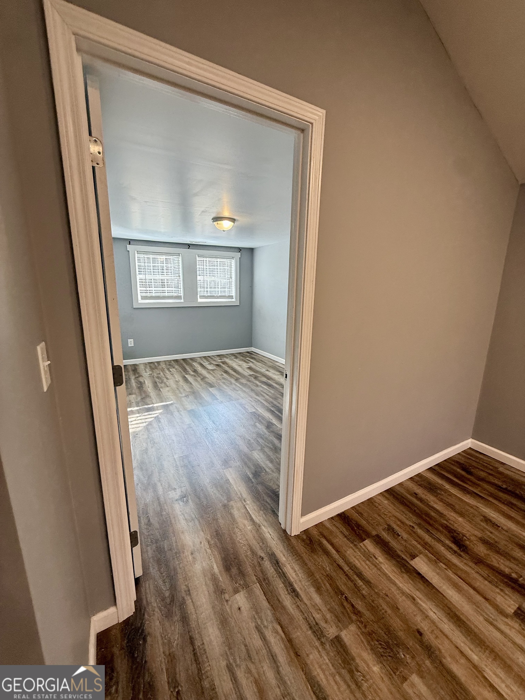 41 6th Street Trion, GA 30753 - Photo 34 of 60 a view of an empty room with wooden floor and a window
