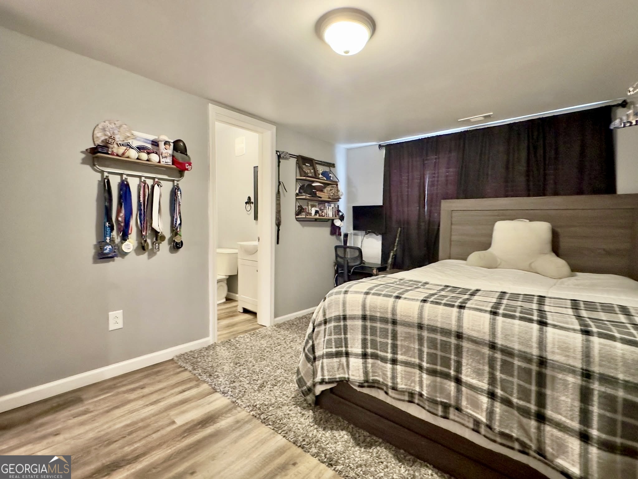 41 6th Street Trion, GA 30753 - Photo 36 of 60 a bedroom with a large bed and a window