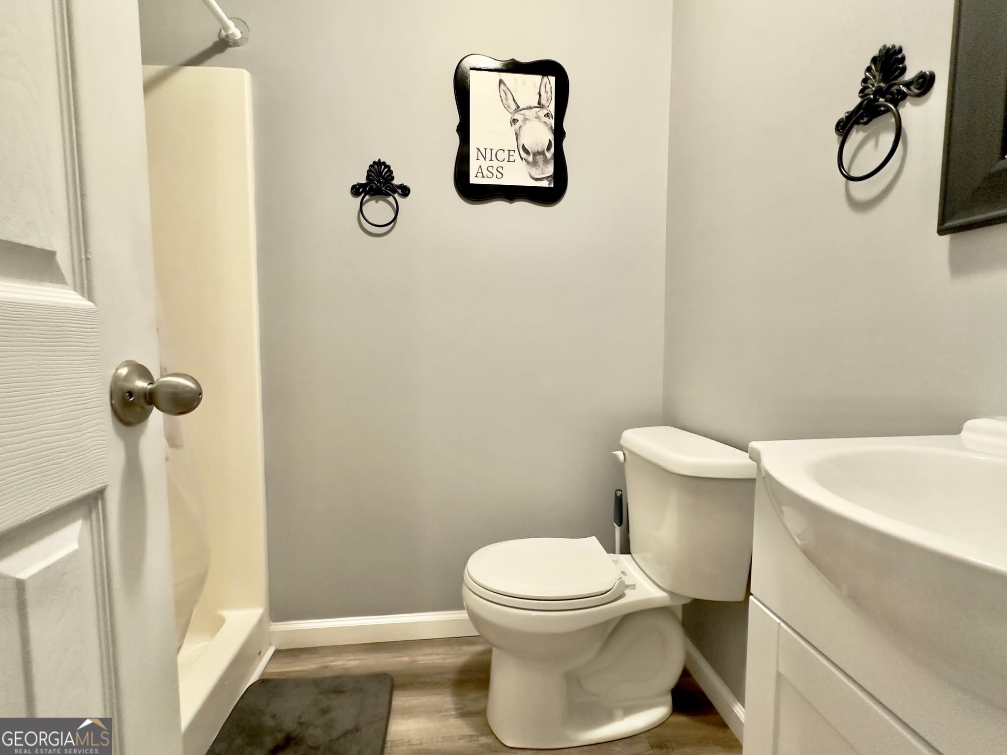 41 6th Street Trion, GA 30753 - Photo 38 of 60 a white toilet sitting next to a bathroom sink