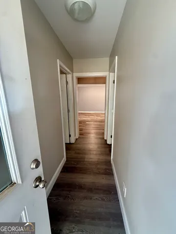 a view of yard with large trees