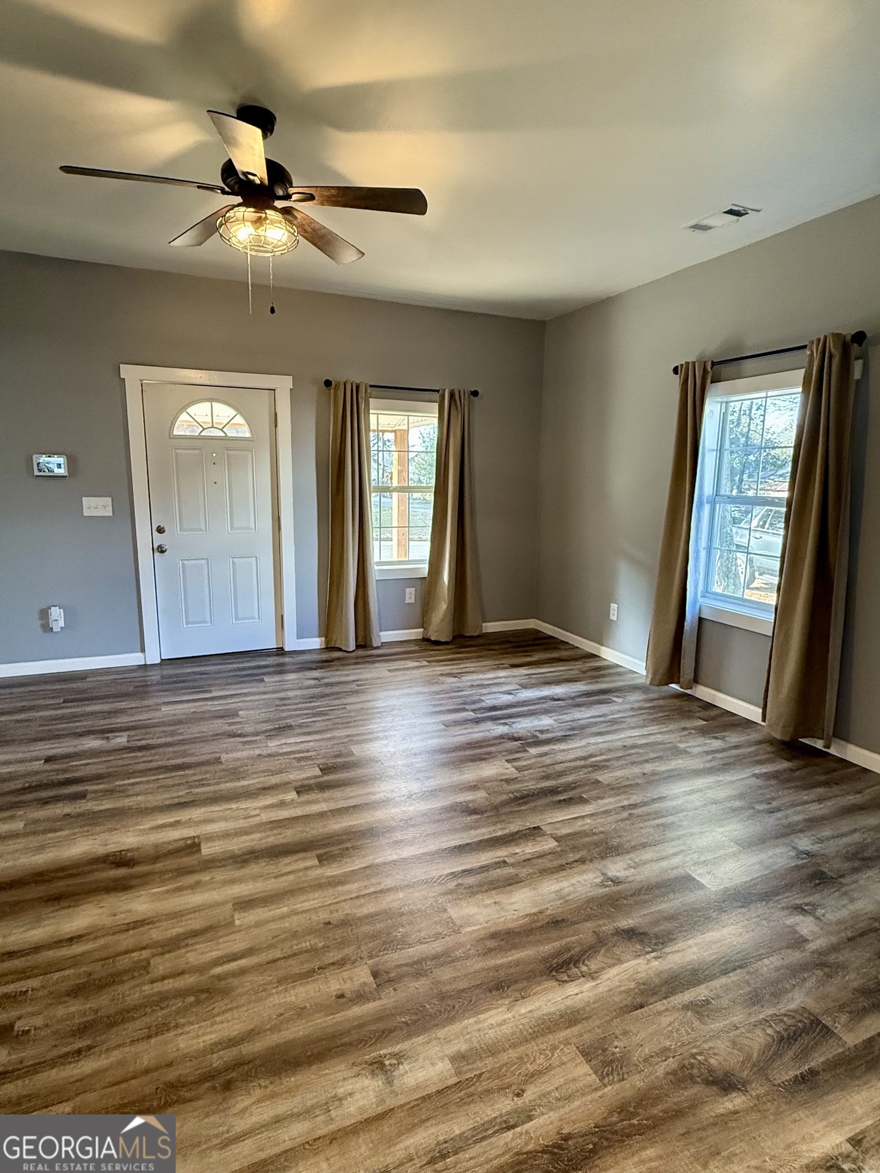 41 6th Street Trion, GA 30753 - Photo 10 of 60 wooden floor in an empty room with a window
