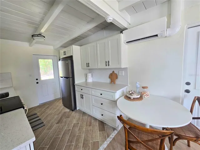 a bed room with a bed and a table