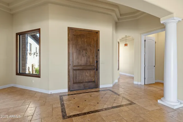 a kitchen with a sink a counter top space and a window