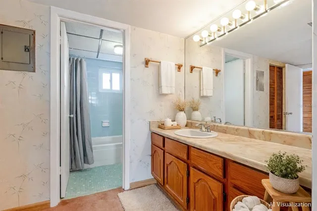 a bathroom with a sink and a mirror