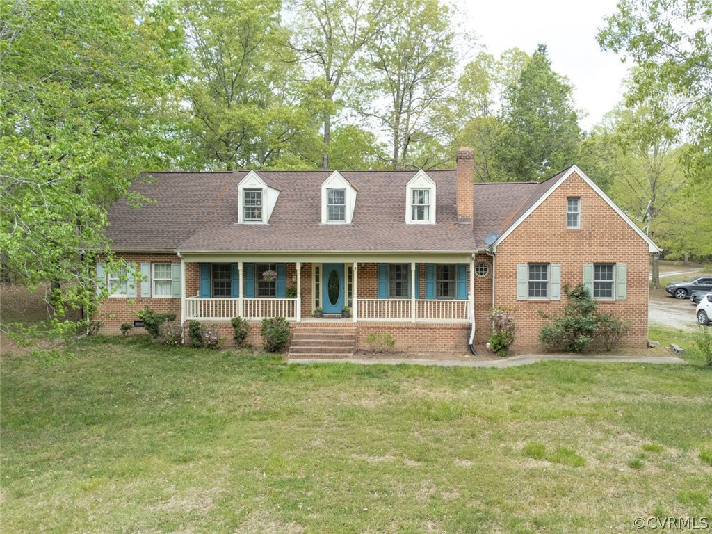 62 Eden Farm Road Bumpass, VA 23024 - Photo 1 of 1 a front view of a house with a yard