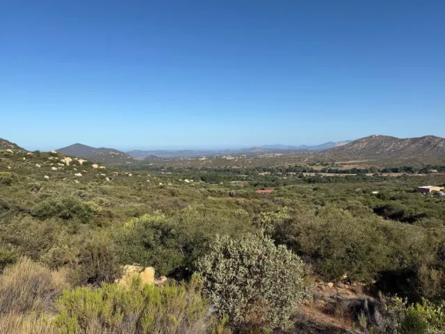 a view of a yard with a snow