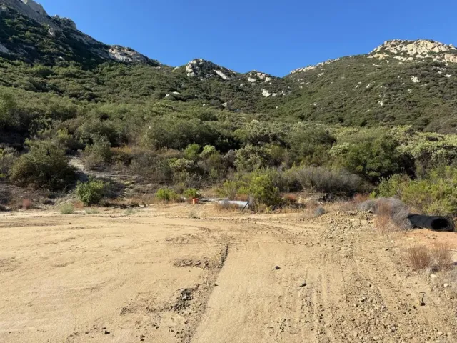 a view of a backyard of a house