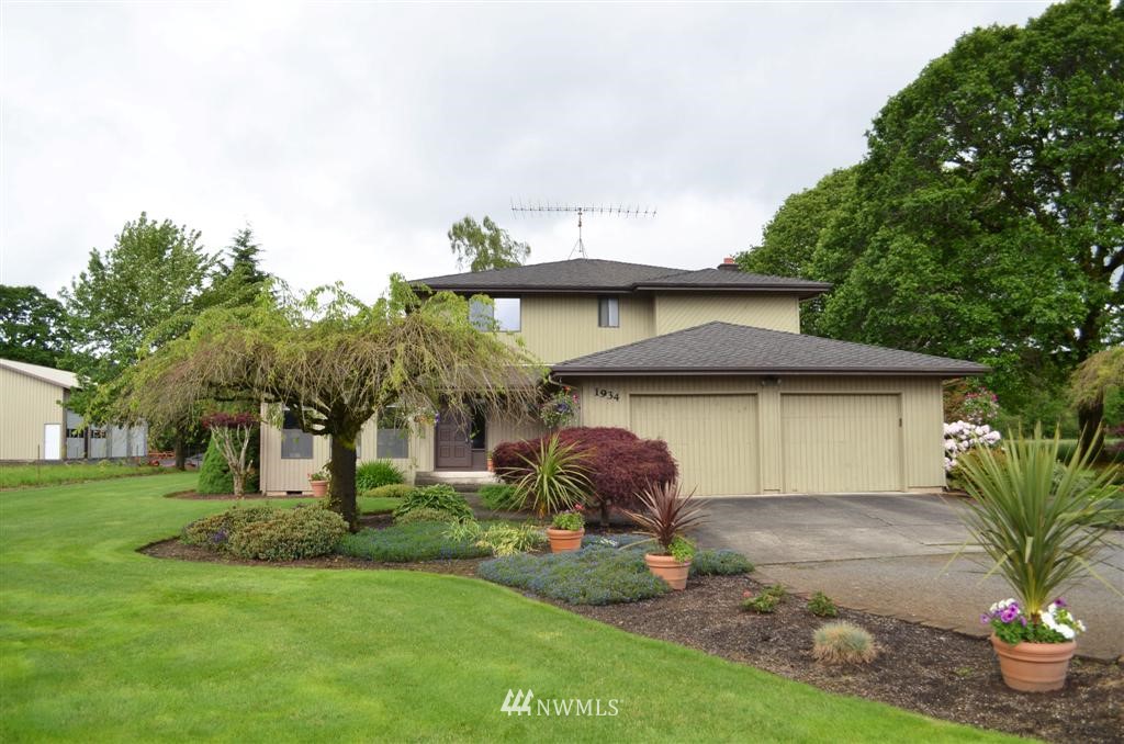 1934 Rice Road Chehalis, WA 98532 - Photo 1 of 15 a front view of a house with garden