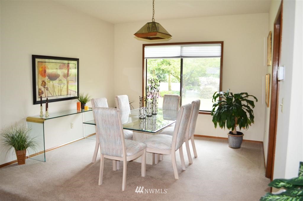 1934 Rice Road Chehalis, WA 98532 - Photo 6 of 15 a dining room with furniture and potted plants