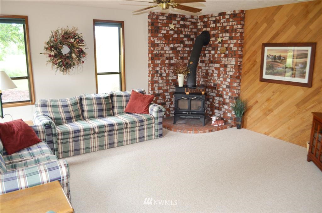 1934 Rice Road Chehalis, WA 98532 - Photo 7 of 15 a living room with furniture and a large window