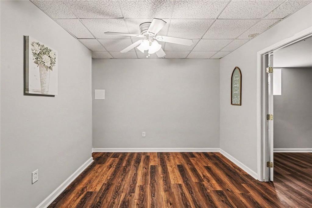 302 Fairview Lane Dallas, GA 30157 - Photo 21 of 26 a view of empty room with wooden floor