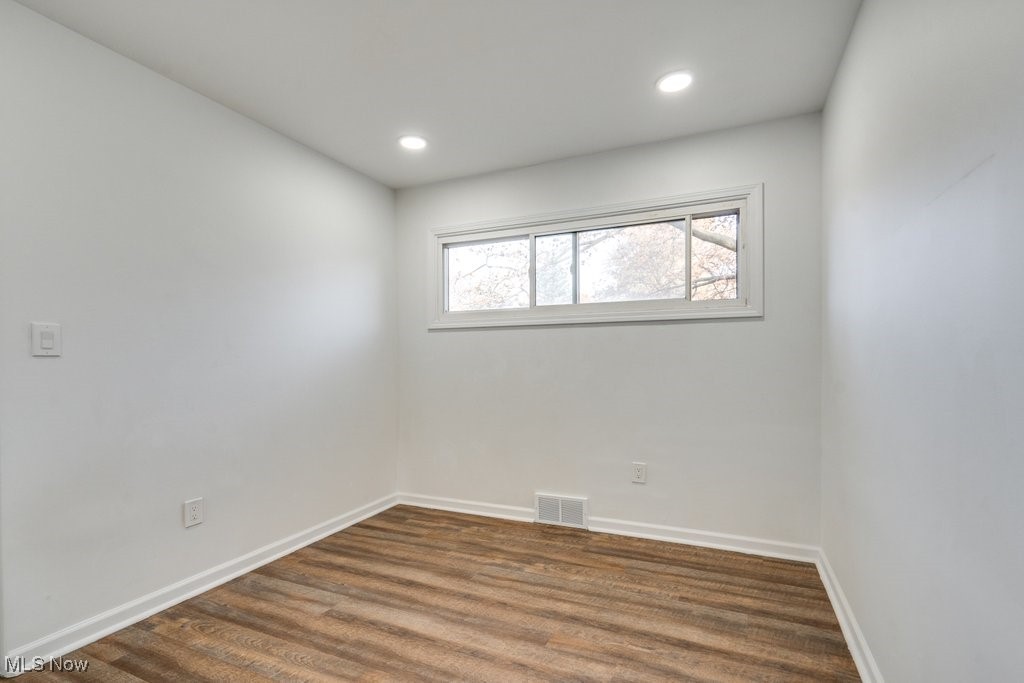 3720 Baird Road Stow, OH 44224 - Photo 25 of 45 Empty room with dark wood-type flooring