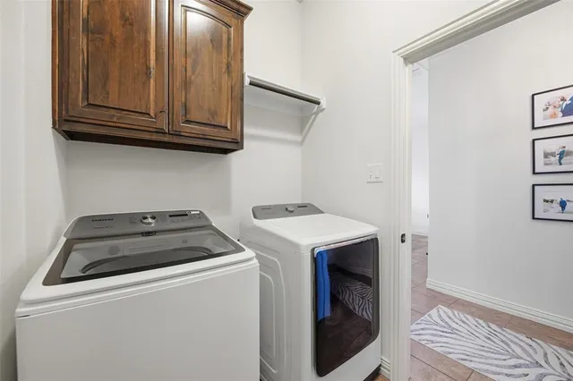 a patio with a table and chairs