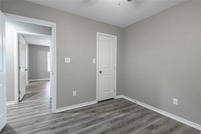 wooden floor & windows in a room