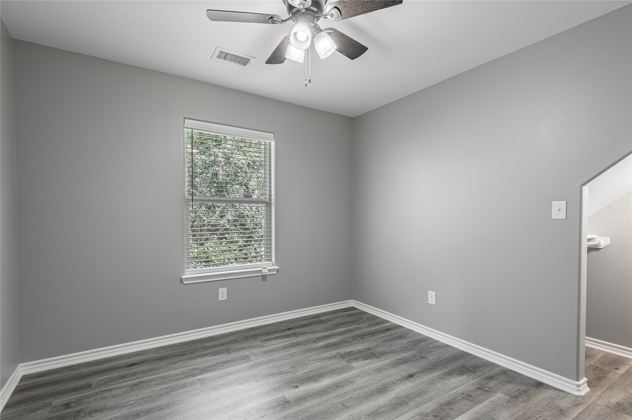 499 Pecan Onalaska, TX 77360 - Photo 22 of 30 a view of an empty room with a window
