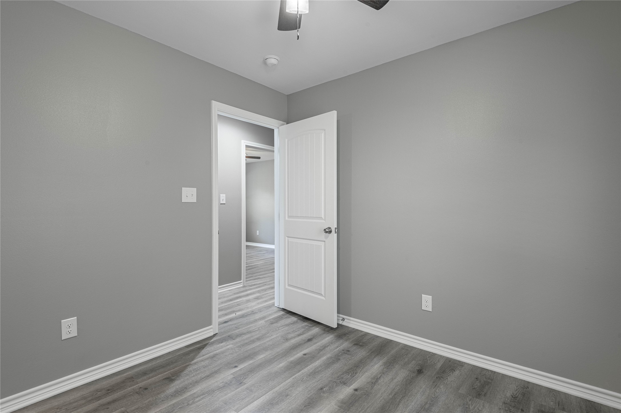 499 Pecan Onalaska, TX 77360 - Photo 24 of 30 wooden floor in an empty room