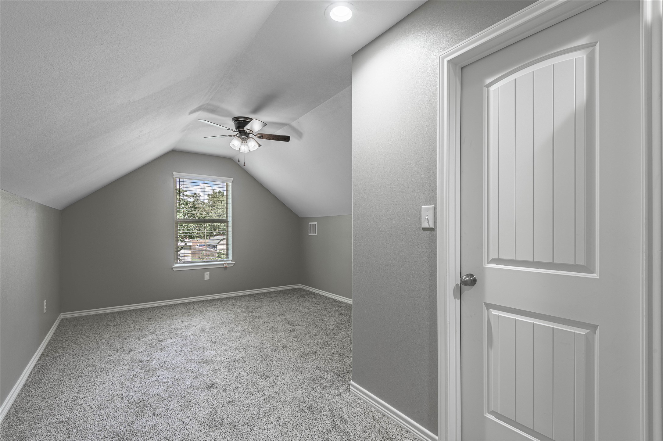499 Pecan Onalaska, TX 77360 - Photo 25 of 30 a view of an empty room with a window