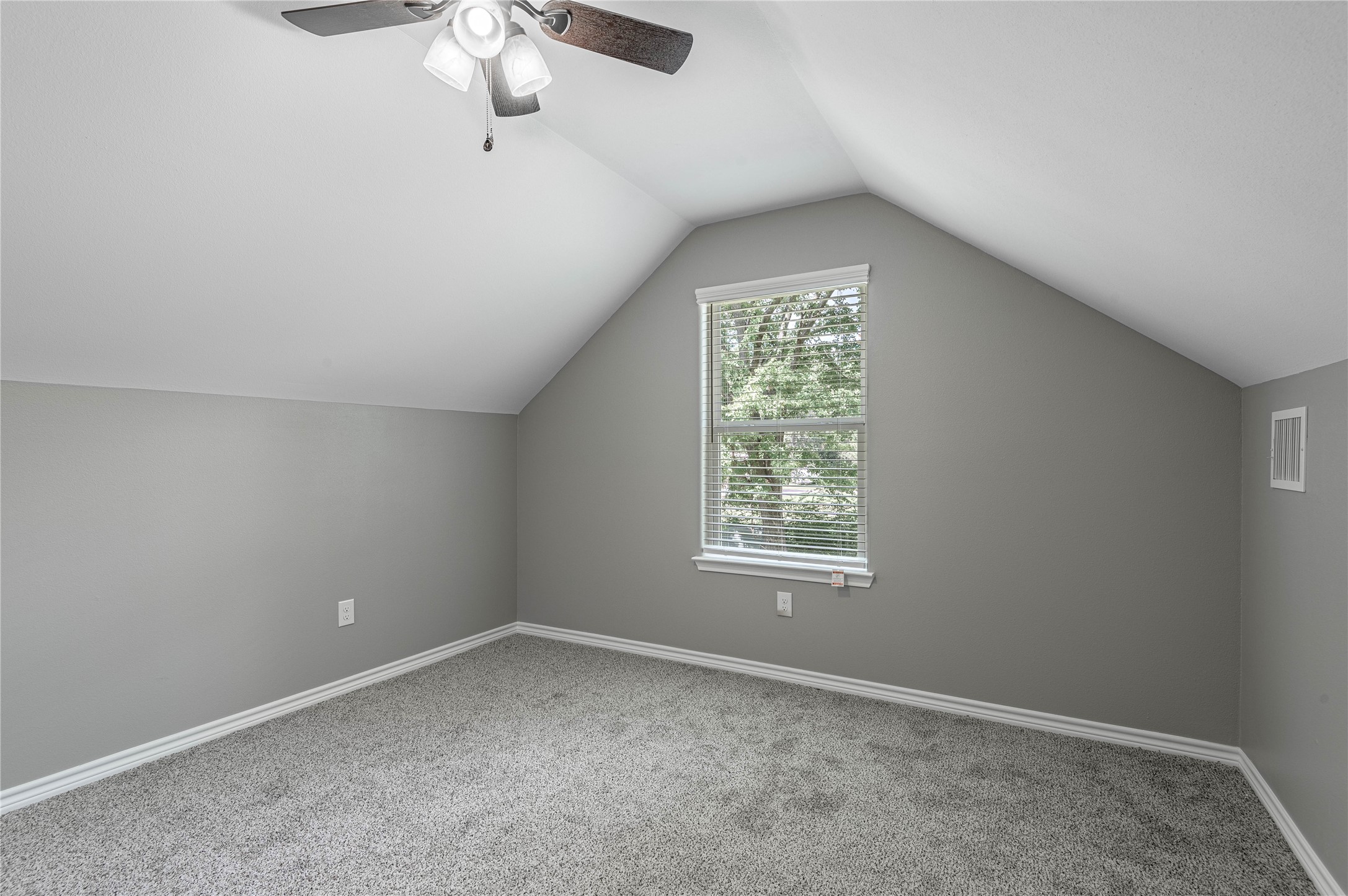 499 Pecan Onalaska, TX 77360 - Photo 26 of 30 an empty room with a window