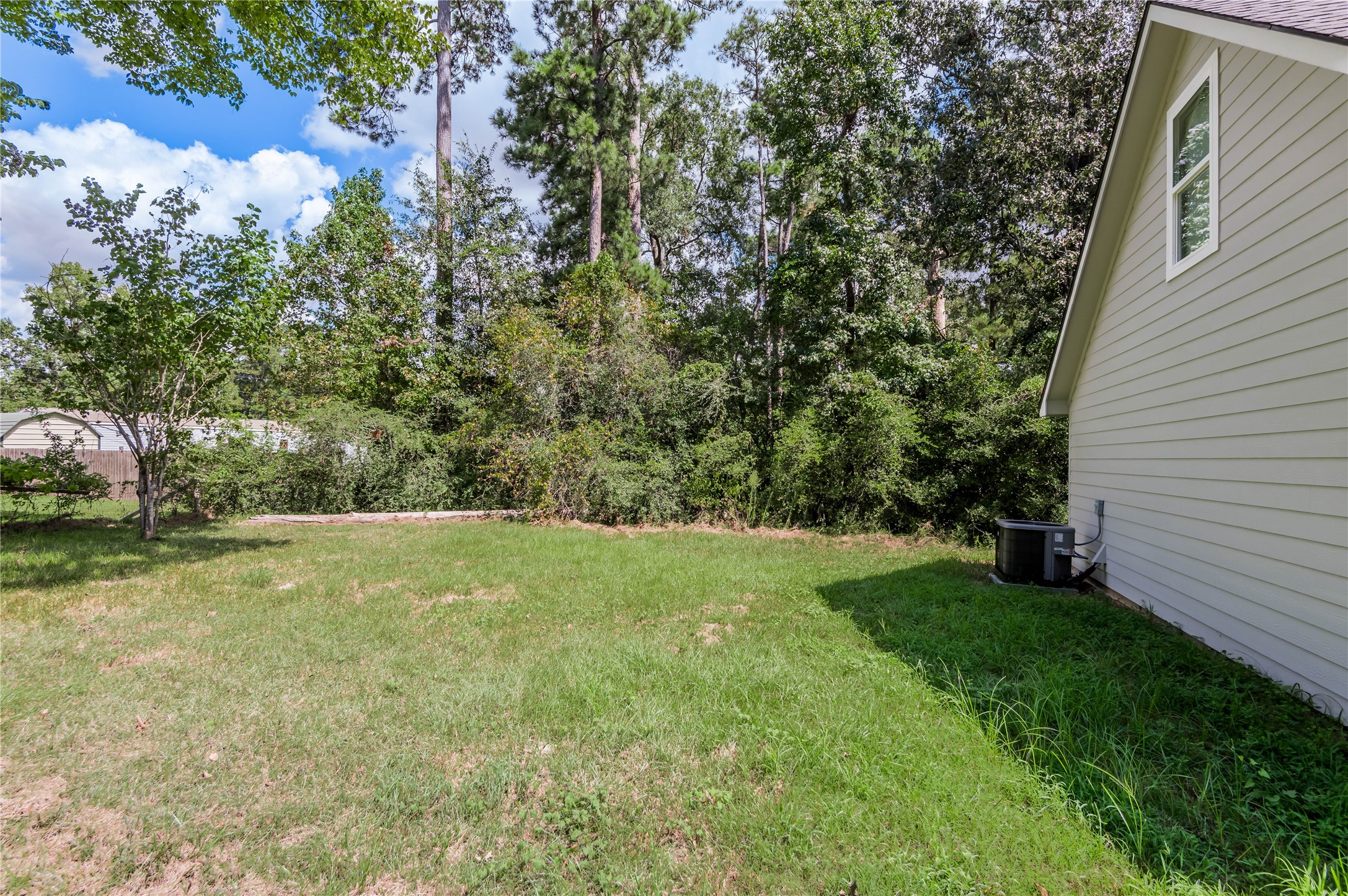 499 Pecan Onalaska, TX 77360 - Photo 29 of 30 a view of a yard with a house
