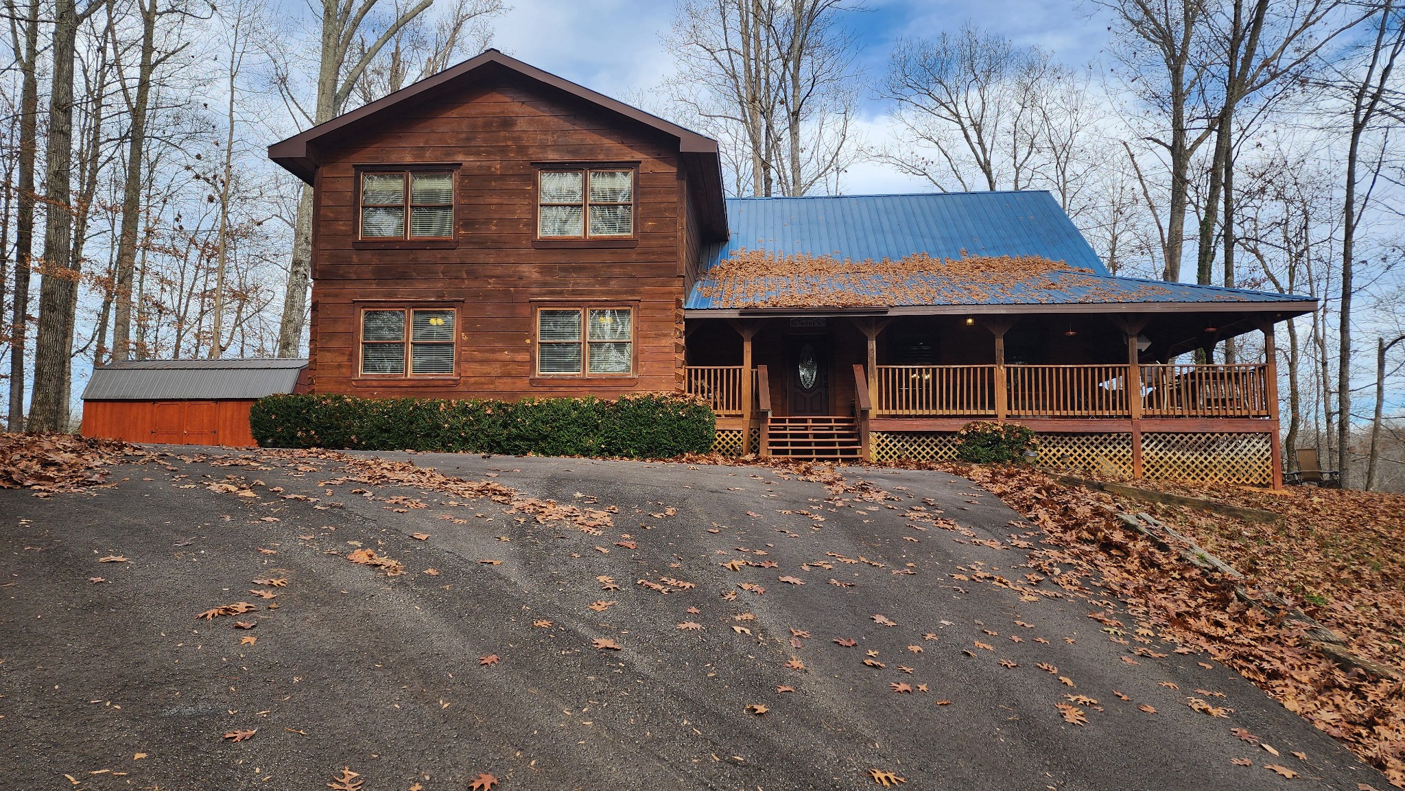 5615 Eastport Road Alpine, TN 38543 - Photo 1 of 83 a front view of a house with garden