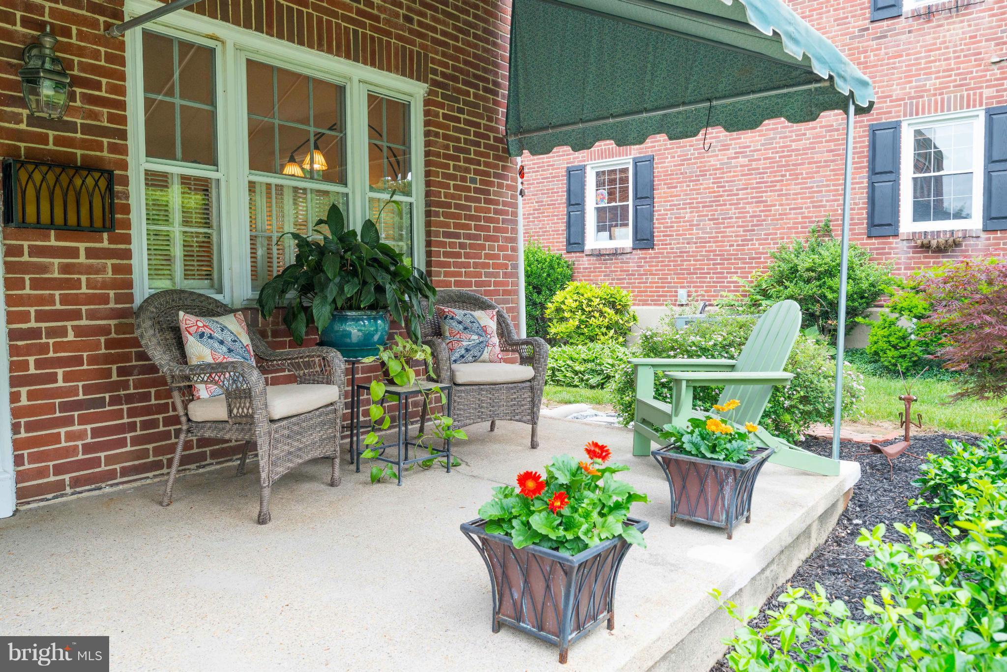 6420 Pinehurst Road Baltimore, MD 21212 - Photo 2 of 30 a view of a chair and table in the backyard
