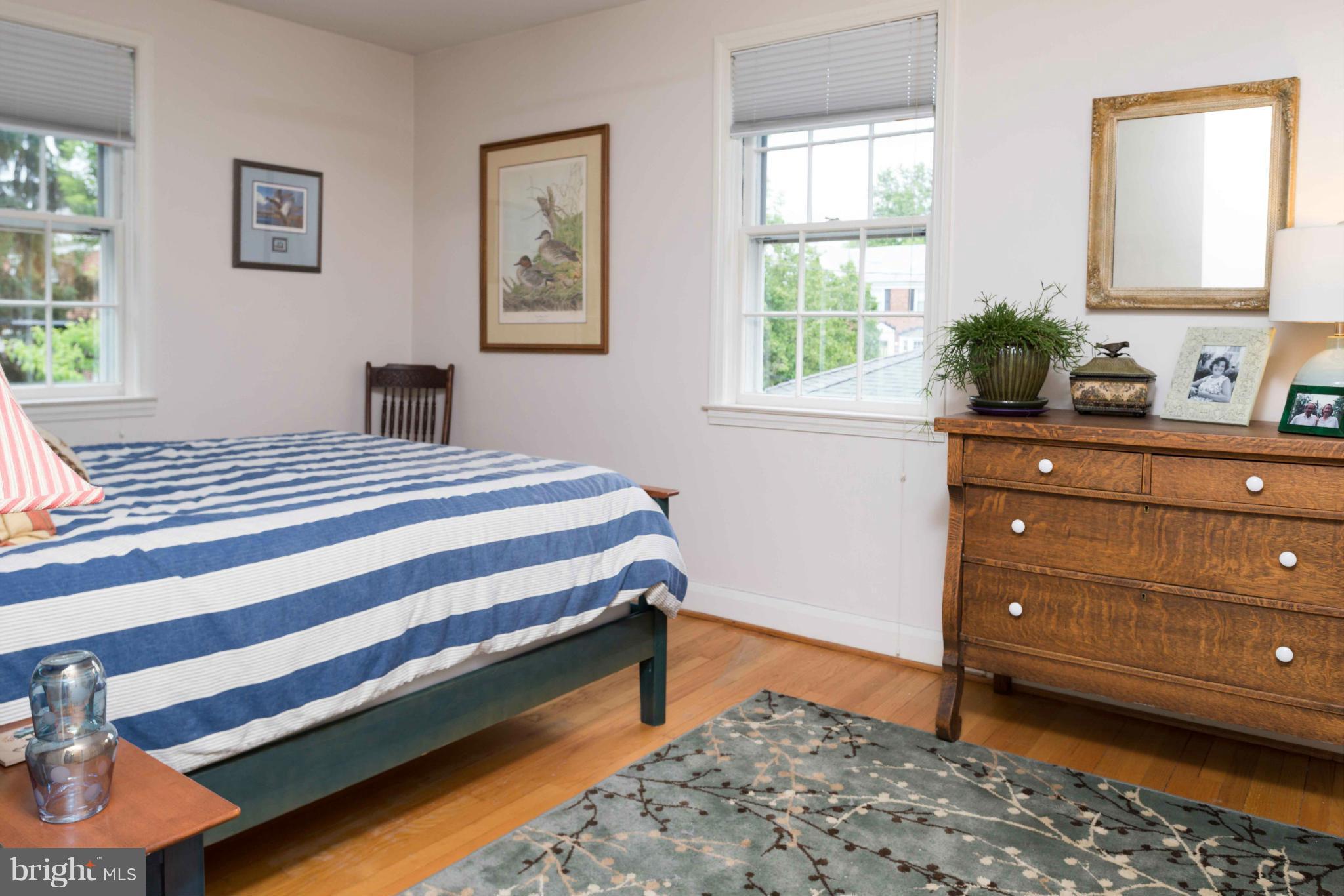 6420 Pinehurst Road Baltimore, MD 21212 - Photo 19 of 30 a bedroom with a bed and a window
