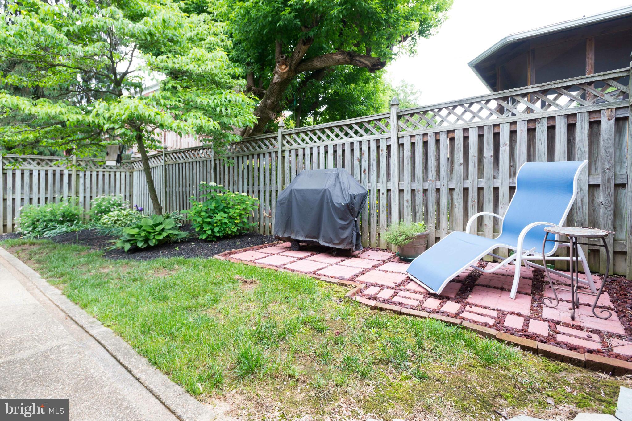 6420 Pinehurst Road Baltimore, MD 21212 - Photo 29 of 30 a view of a chairs and backyard with a small yard