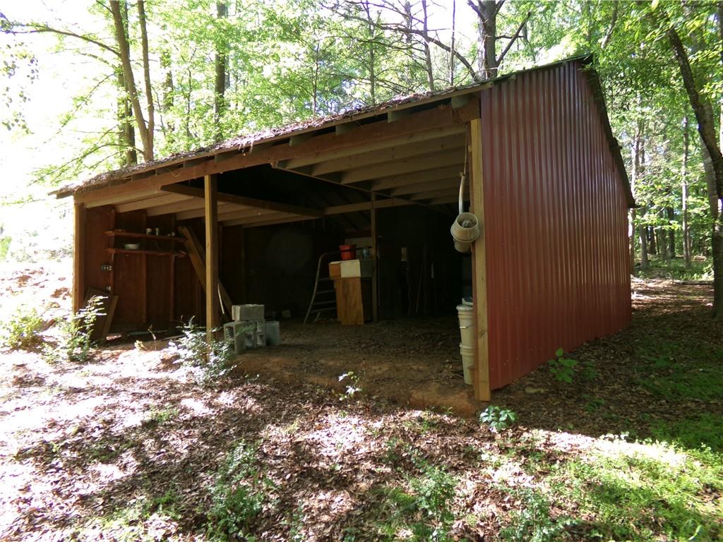 3905 Highway 138 Covington, GA 30014 - Photo 34 of 40 a view of a small house with green space