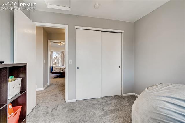 6652 Hannah Rose Road Colorado Springs, CO 80923 - Photo 21 of 28 Third upper bedroom, all three bedrooms are on the upper level.