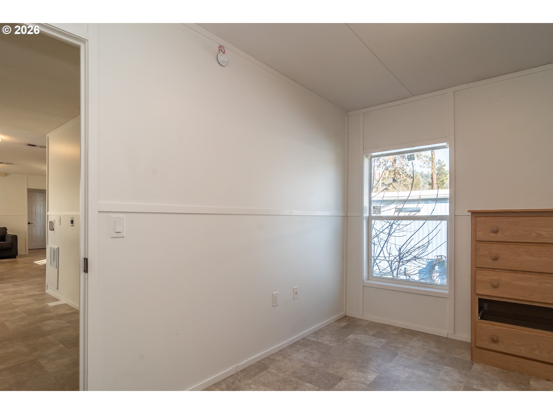 5000 Northeast Stephens Street, Unit 27 Roseburg, OR 97470 - Photo 16 of 24 a view of an empty room and window