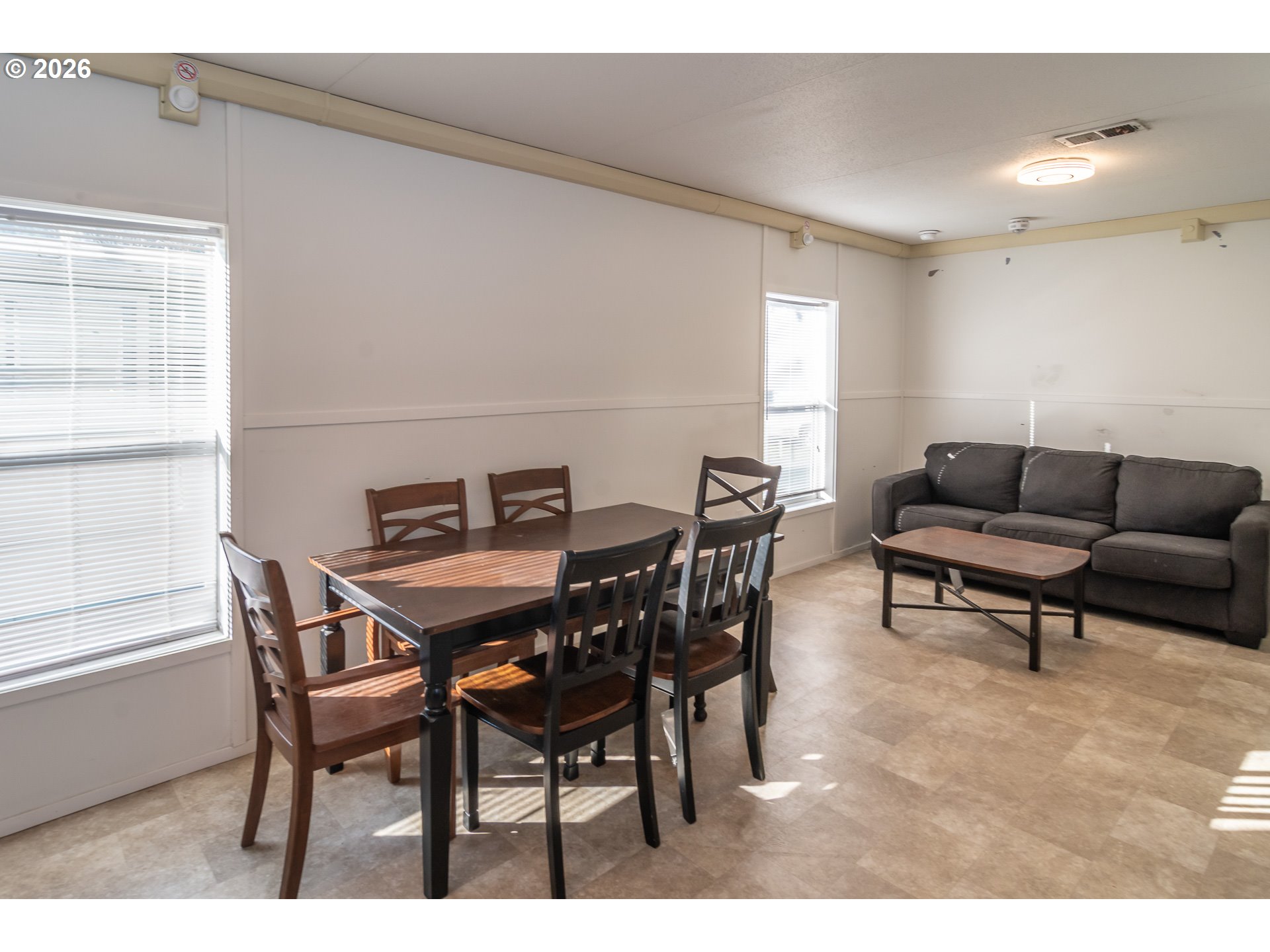 5000 Northeast Stephens Street, Unit 27 Roseburg, OR 97470 - Photo 20 of 24 a view of a dining room with furniture and window