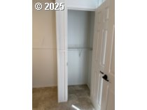 5000 Northeast Stephens Street, Unit 27 Roseburg, OR 97470 - Photo 2 of 24 a view of a hallway with painted walls