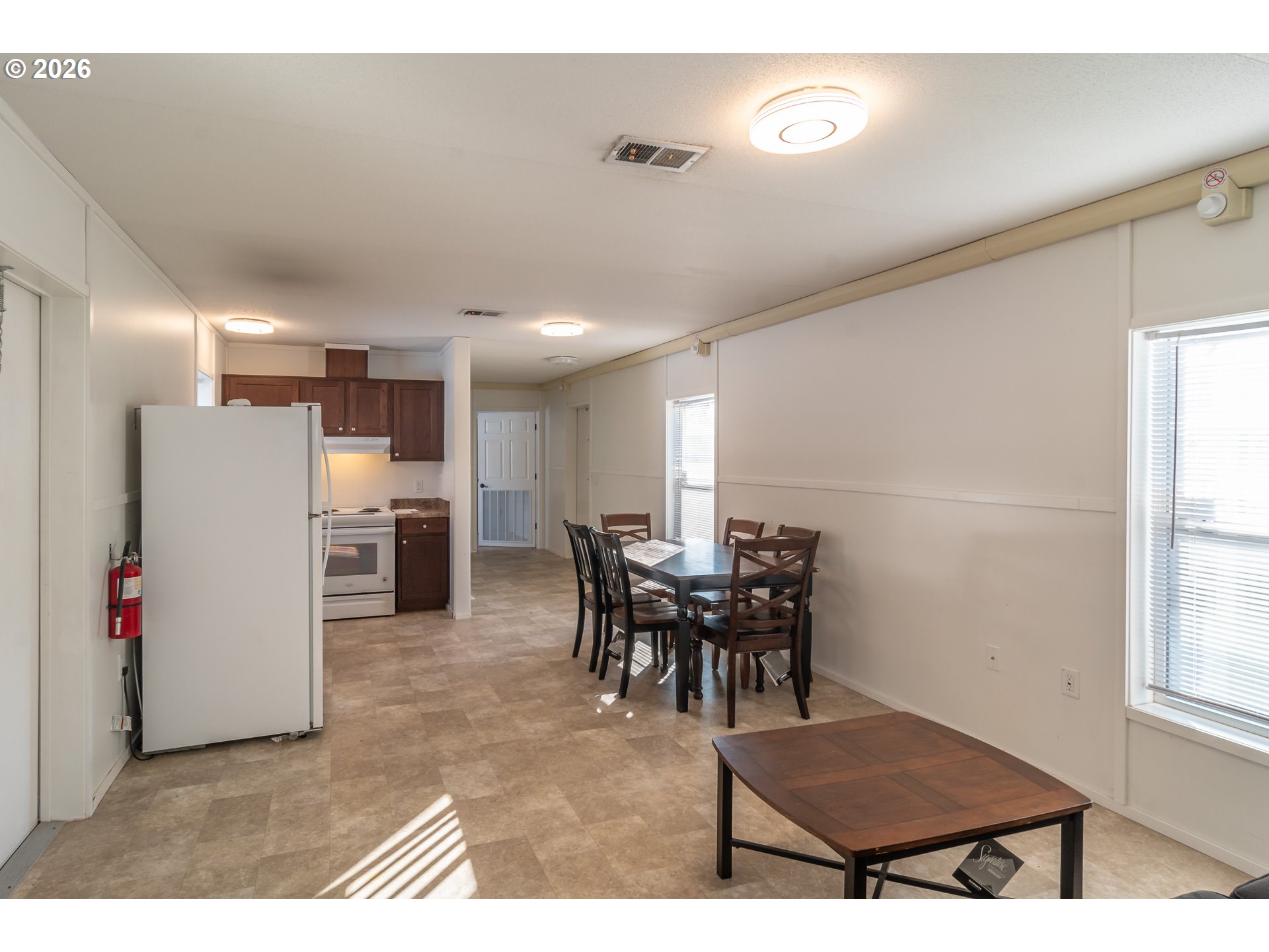 5000 Northeast Stephens Street, Unit 27 Roseburg, OR 97470 - Photo 23 of 24 a view of a dining room with furniture