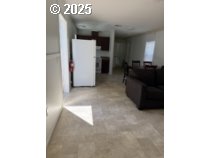 5000 Northeast Stephens Street, Unit 27 Roseburg, OR 97470 - Photo 3 of 24 a view of a living room with bathroom