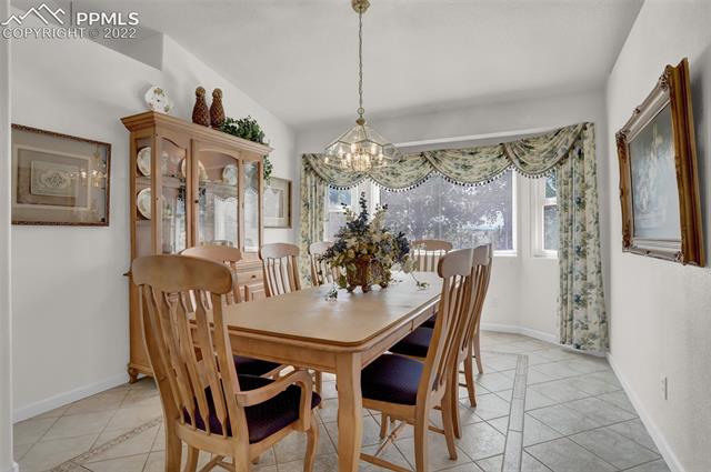 12425 Old Barn Road Elbert, CO 80106 - Photo 14 of 36 A beautiful formal dining room with bay windows!