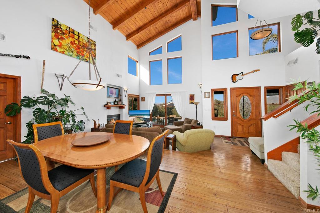 589 Anderson Road Alpine, CA 91901 - Photo 24 of 54 a dining room with furniture and wooden floor