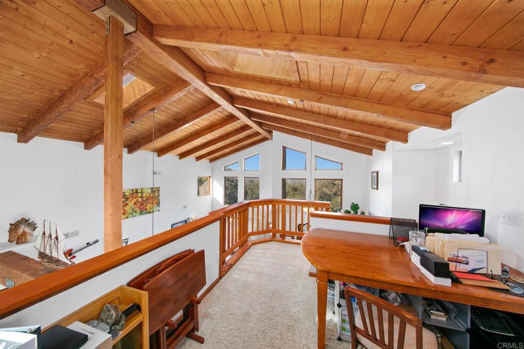 589 Anderson Road Alpine, CA 91901 - Photo 27 of 54 a dining room with furniture and a window