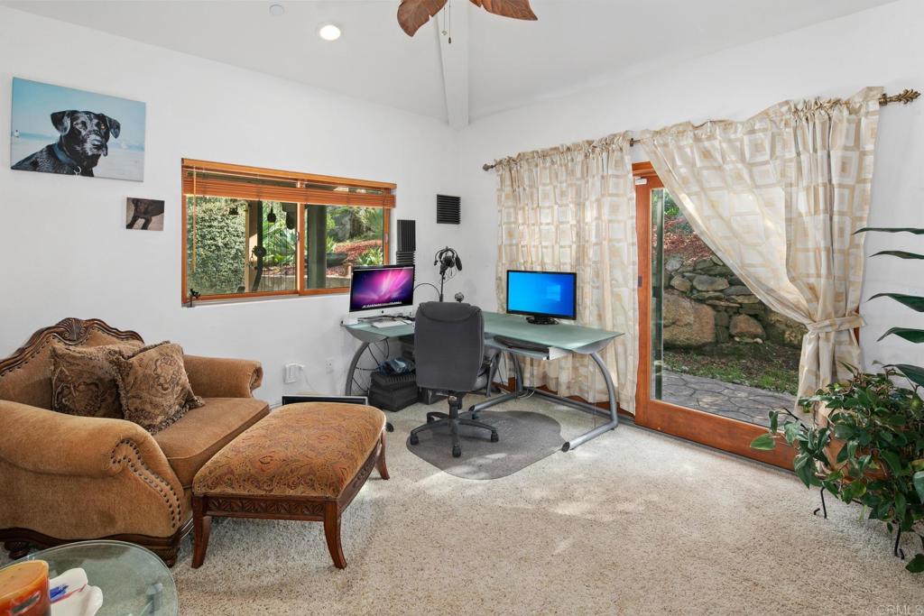 589 Anderson Road Alpine, CA 91901 - Photo 29 of 54 a living room with furniture and a window