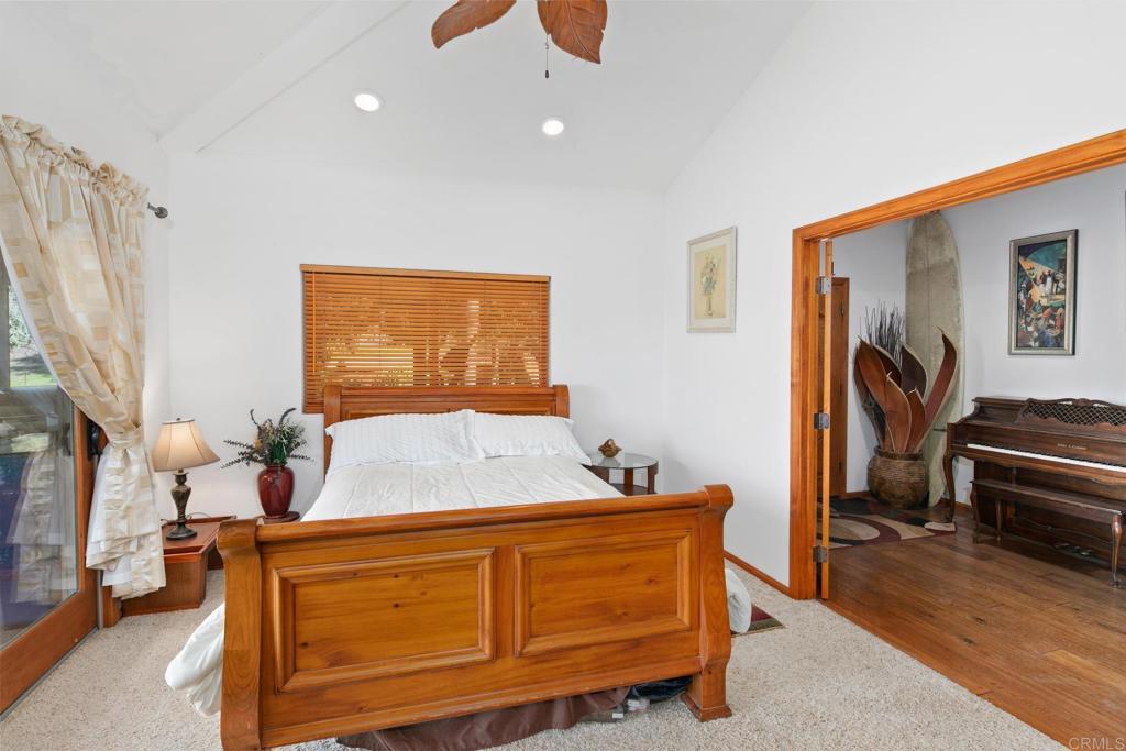 589 Anderson Road Alpine, CA 91901 - Photo 33 of 54 a bedroom with a bed and a window