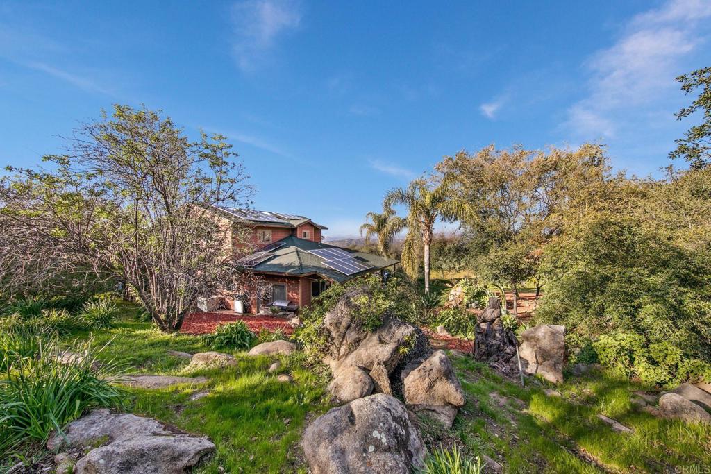 589 Anderson Road Alpine, CA 91901 - Photo 43 of 54 a view of a lake with a building in front of it