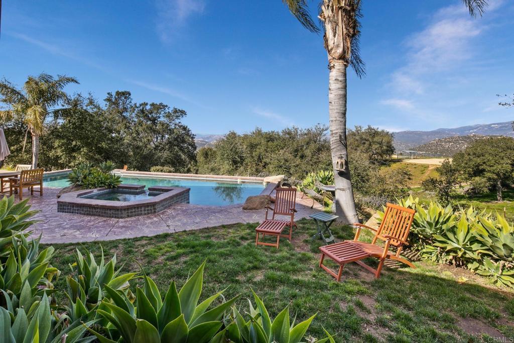 589 Anderson Road Alpine, CA 91901 - Photo 5 of 54 a view of a backyard with plants and a patio