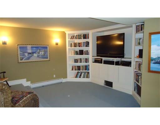 38 Ridge View Road Northampton, MA 01062 - Photo 24 of 30 a living room with a flat screen tv and a large window